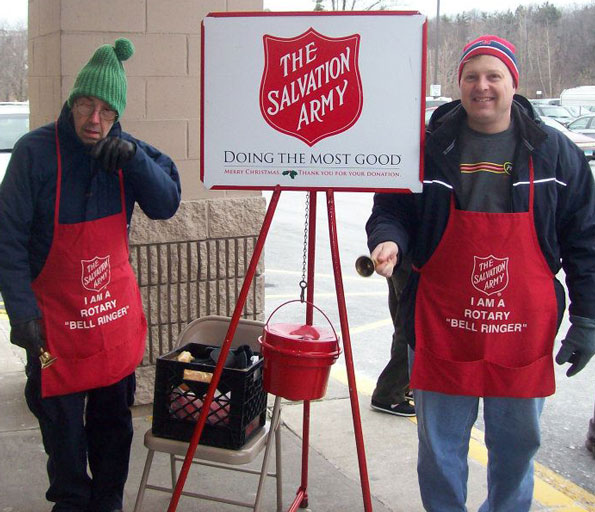 My dad and I ringing the bell for Salvation Army